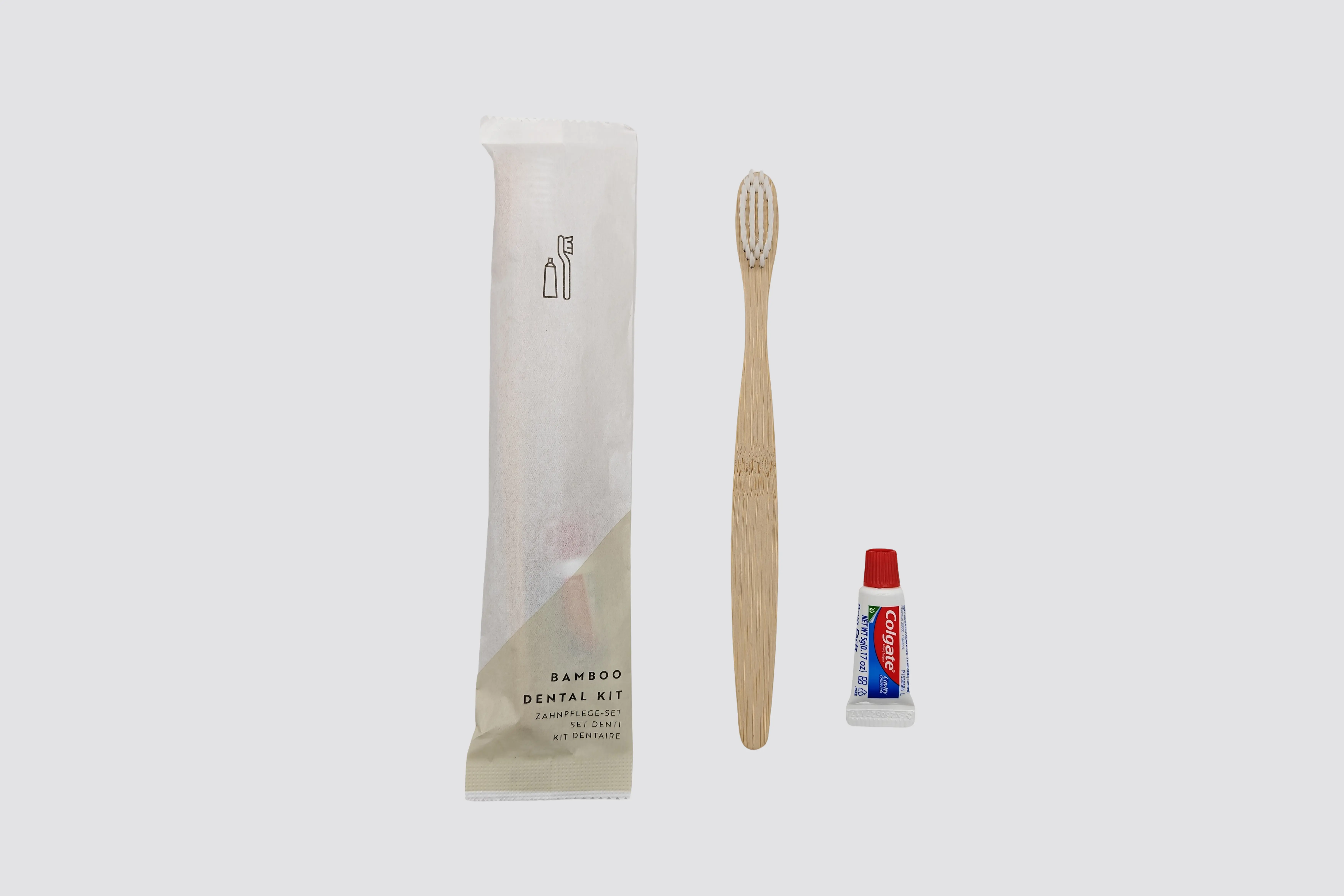 Set dental en sobre de papel con cepillo de bambú y pasta dental